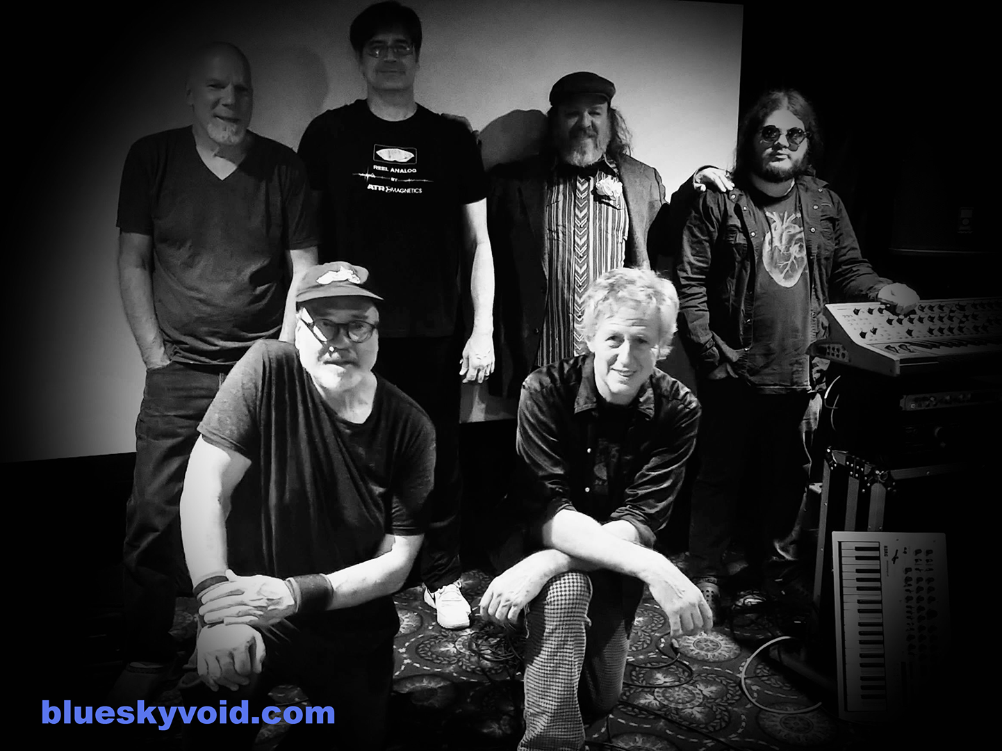 Our music doesn’t fit a particular genre. We have a range that goes from rock to jazz from dance to noise. 

We never know what we’re going to come up with each piece we craft.  

We consists of a keyboard player, a sound crafter who creates his own patches with a computer and piano keyboard, a percussionist who uses a keyboard and electronic finger pads, a drummer who uses two different electronic drum pad sets simultaneously, a bass player with a rig of pedals and a singer who makes up lyrics on the fly and uses lots of effects on his voice.  